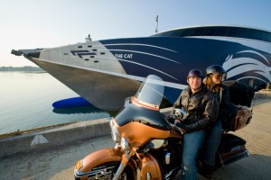 You can take your motorbike on the Cat Ferry.