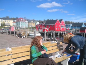 Tourists having a picnic in Lunenburg, a good way to save money!
