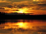 A stunning sunset over a lake in Kejimkujik National Park